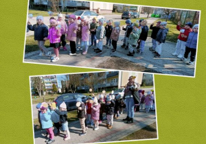 Grupa Jezyków i Pszczółek trzyma w rękach wiosenne emblematy przed przedszkolem