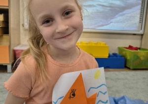 Iga z rybką z origami.